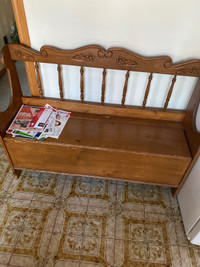 Wooden bench with storage space 