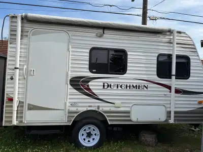 Dutchmen 18 ft trailer. Great for one or 2 people. Bench turns into queen bed. Bathroom with shower....