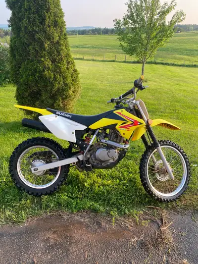 Suzuki 125L great condition, runs good. Good tires, comes with extra sprocket,chain, tire.
