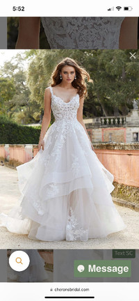 Wedding dress by Morilee Faustina ball gown in ivory.  $999