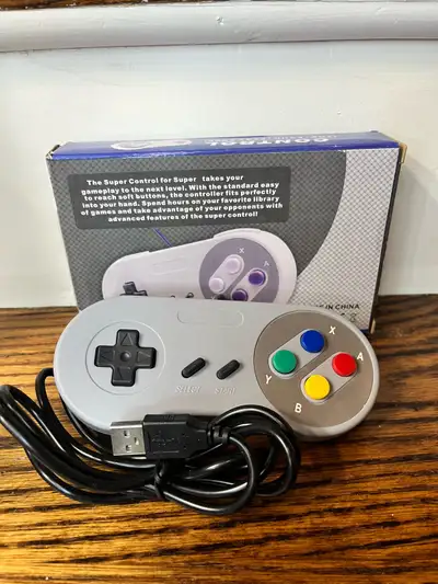 New SNES style USB controller. Has that classic feel, perfect for retro gaming on your PC or Raspber...