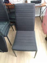 6 black chairs... cushioned...pet free and smoke free home