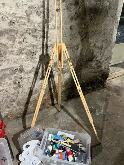 Wooden art easel with assortment of paints and brushes. Pick up in Stirling.