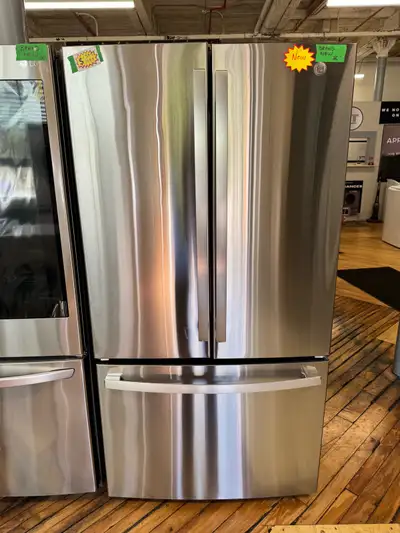 GE 36 inch three door fridge scratch and dent the measurements are 36 inches wide 33 inches deep and...