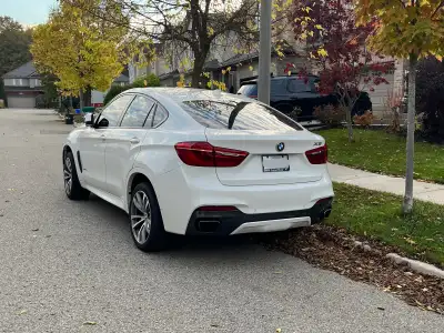 Vehicle Highlights: This 2016 BMW X6 xDrive35i combines SUV practicality with strong performance, al...