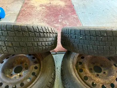 Winter tires originally for 2009 Grand Caravan on rims 215 60r 16
