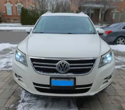 Selling white 2010 VW Tiguan Comfortline as-is (No safety certification) - driven 222,000km - AWD -...