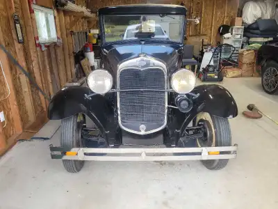Car is always in garage. Runs and drives good.dark blue with black fenders.