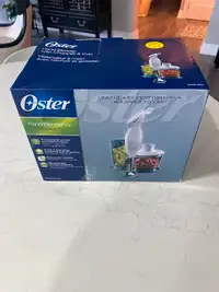 BNIB Oster® Hand Blender with Cup and Chopper.
