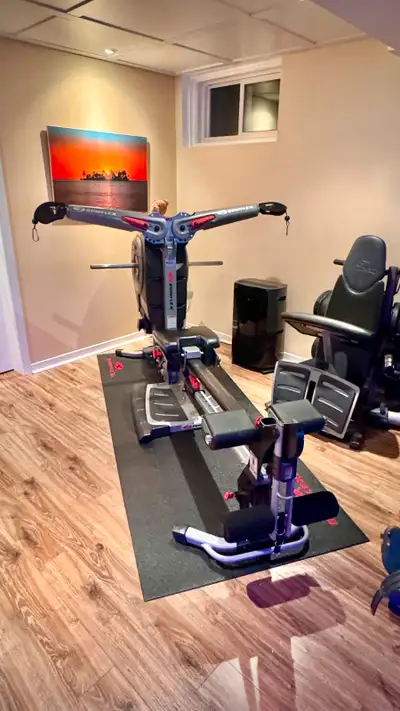 BowFlex Revolution with Rack and Carpet, View more