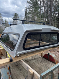 Truck cap with roof racks