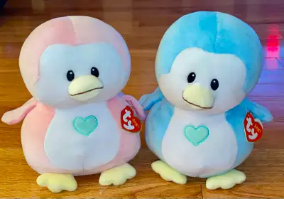 Hard to find larger 8 inch plush Ty Penguins Blue Twinkles & Pink Penny...both New with tags....pric...