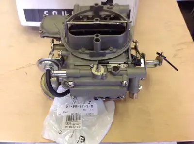 Restored rare Holley for E body. Includes NOS choke assembly. Please contact for more info.