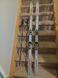 203cm Head downhill Skis, $35, poles are sold