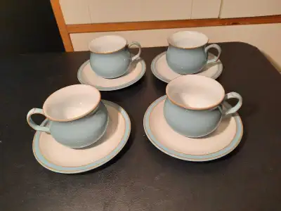 These are four Denby Colonial Blue cups and saucers, in like-new condition, offering a charming vint...