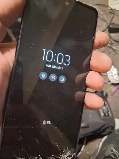 I will pay someone to unlock my cell phone and replace the screen, or trade them something of there...