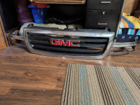 GMC grill/front clip in good shape no cracks