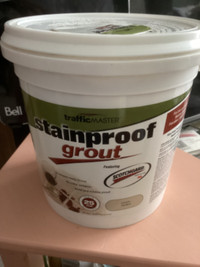 Sanded stain proof grout -colour is canvas.  1 gallon tub unopen