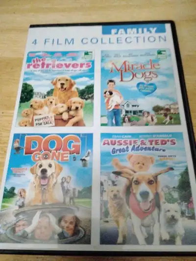 I'm selling a used 4 Film Family Collection DVD featuring dog-themed movies, perfect for family ente...