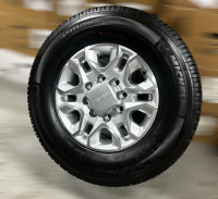 21. All Season 2024 Chevy Silverado 2500 OEM rims and tires