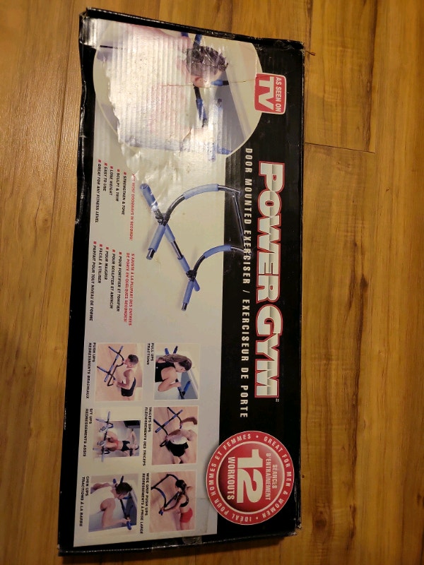 Power gym door mounted exerciser and chin up bar. Still in box