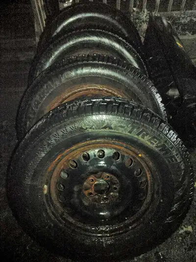 Like new set of P245/45/R18 tires (2) Used winter tires with approx 50% tread Came off Nissan Murano...