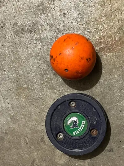 Hockey stick and training pucks, View more