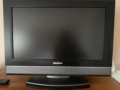 Insignia 26” Flatscreen LCD TV In Great Condition With Wireless Remote. Includes multiple RCA Audio...