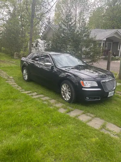 Chrysler 300 Limited as is, with all the bells and whistles! Works and drives well. Minor damage to...