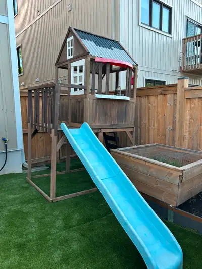 Kidcraft Playground from Costco with play kitchen, ladder and slide. Used 2 seasons, kids have outgr...