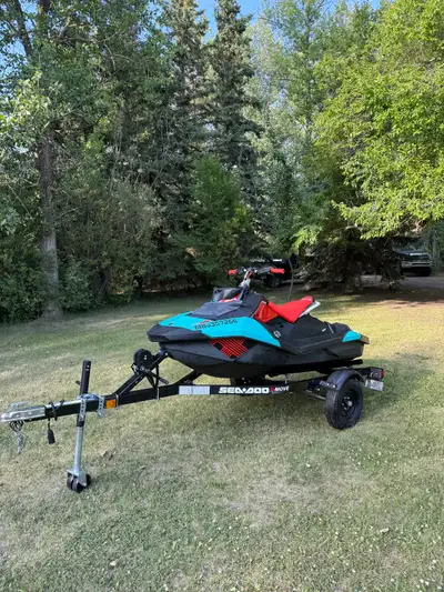 Selling my 2017 sea doo spark trixx in good shape comes with a nice seadoo move trailer with new bla...