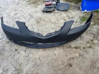 03-6 Mazda 3 bumper. Brand new primed and ready for paint. Located in Muskoka although willing to me...