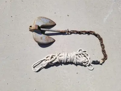 20 lb. Danforth anchor 26" chain rode and 40' of 1/2" rope. Heavy hold and easy release.
