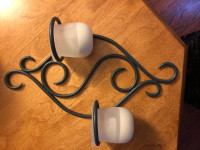 Designer black metal wall sconce with frosted glass candle