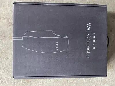 Band new sealed in box Tesla gen 3 wall connector.