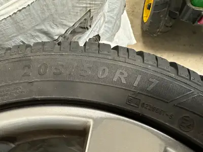 German Borbet 17 inch aluminum rims and 205/50 R 17 inch Dunlop SP sport winter tires. Only used two...