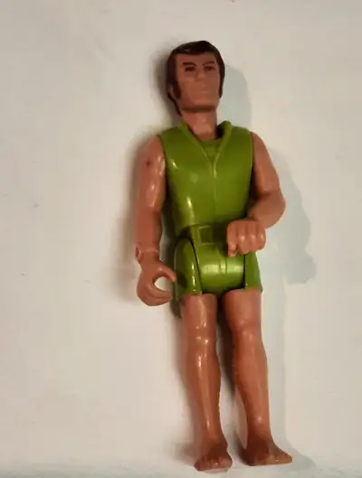 3.75" high x 1.25" wide. Hong Kong. Rare with intact dolphin badge. Modeled after Jacques Cousteau....