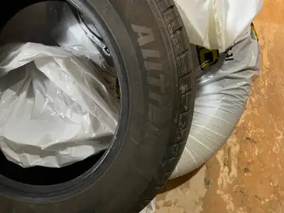 I am not sure how worn these tires are but when they came off the garage said still good.