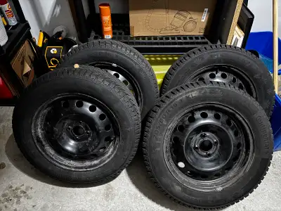 Offering a set of four Continental WinterContact TS830 winter tires, size 205/60R16, mounted on stee...