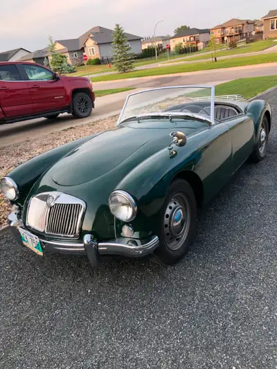 SOLID CAR PAINTED BRITISH GREEN, INTERIOR IN GREAT SHAPE ,CHROME LOOKS LIKE NEW. HAD SAFETY IN JULY...