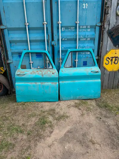 1964-66 Chevy truck doors in fair shape no rust but they do have a few dents. Both have glass one ve...