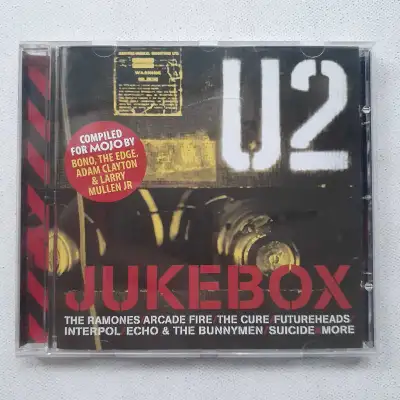 You will receive the Mojo magazine cd, U2 Jukebox. Compiled for Mojo by Bono, The Edge, Adam Clayton...