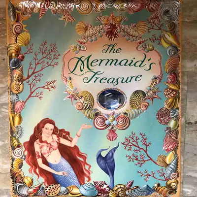 The Mermaid’s Treasure Hardcover Book, View more