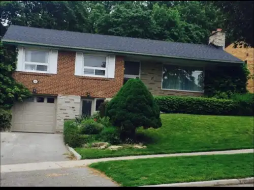 Lower level of a bungalow house (basement but door is street level with no stairs going down) of a 1...