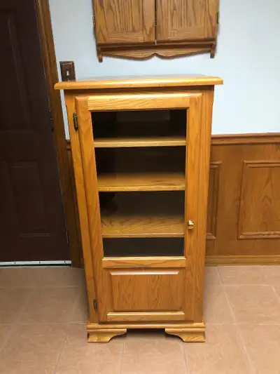 Yes it's Available no need to ask. Beautiful Oak Stereo Cabinet, Entertainment Unit. Perfect for you...