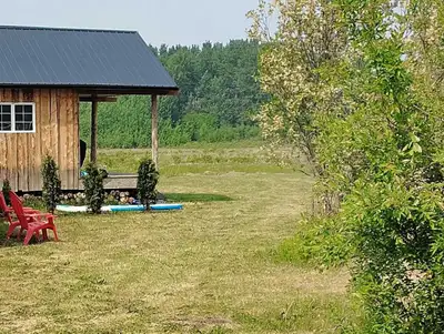 Gorgeous New Lake Cabin On Huge Lot Steps away to sparkling Lesser Slave Lake. Close to the Marina a...
