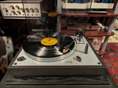 Up for sale a Thorens TD-166 MK-II belt-drive turntable (record player) with a nice Grado cartridge....