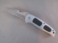 folding knife with blade lock and belt clip