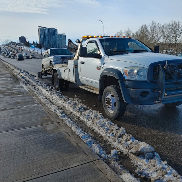 Towing,Battery Boost, Tire Change in Towing & Scrap Removal in Calgary