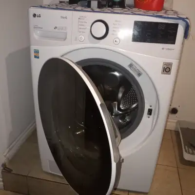 LG Washer and Insignia Stove, View more